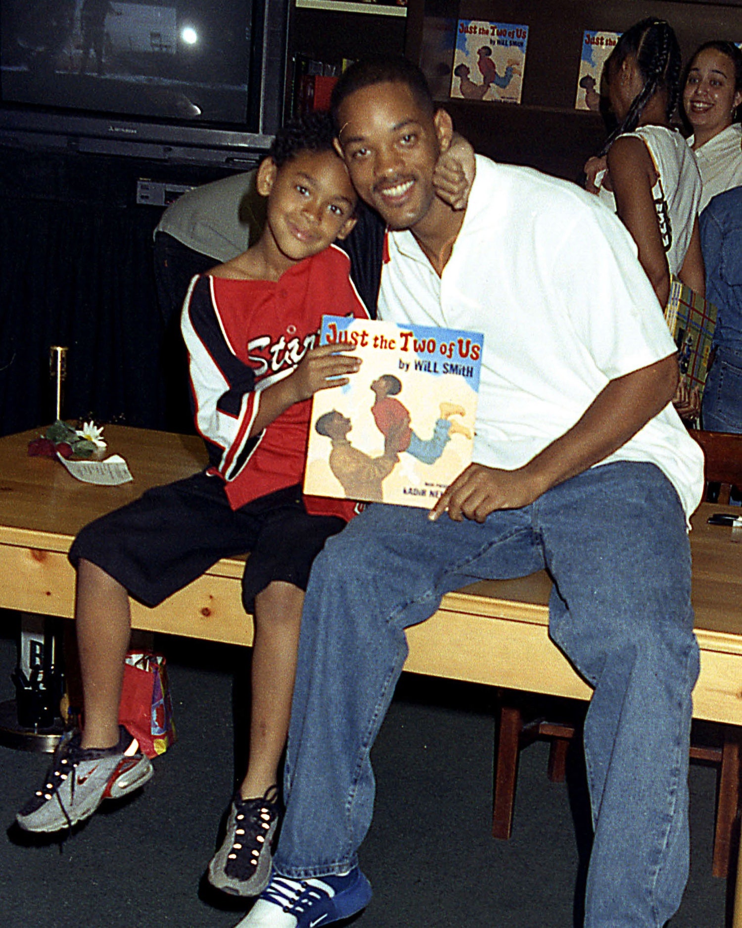 Will Smith ​and his son Trey Smith, smiling and posing for a photo.