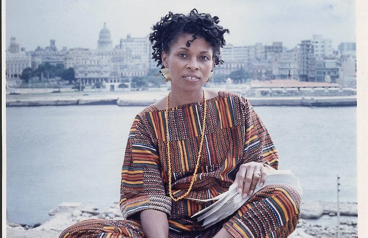 Havana, Cuba: JoAnn Chesimard, aka Assata Shakur, holding the manuscript of her autobiography wiht⁤ Old Havana, Cuba, in⁤ the background on October 7, 1987.