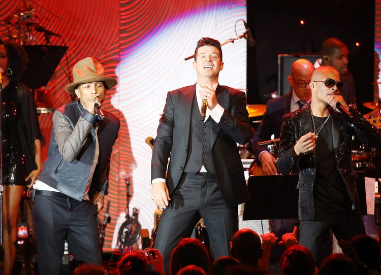 Pharrell, Robin Thicke, and T.I.