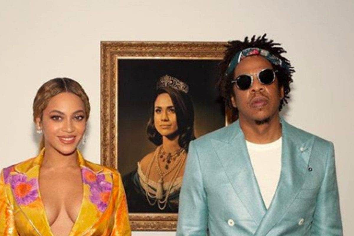 JAYZ and Beyoncé accepts BRIT Award in front of Meghan Markle portrait