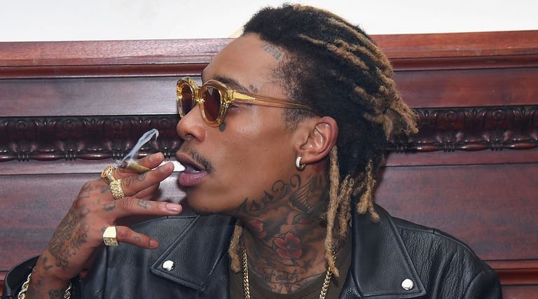 rappers who smoke cigarettes Wiz Khalifa “Smokin' Section” (Video)