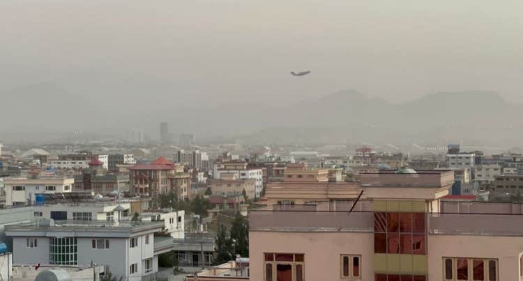At least 13 people dead after suicide bombers, gunmen attack Kabul airport