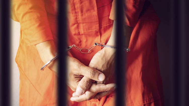 RICO handcuffed prisoner