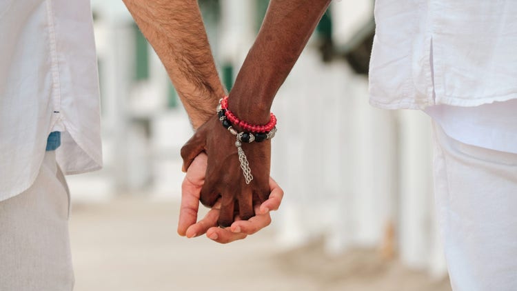 Men holding hands