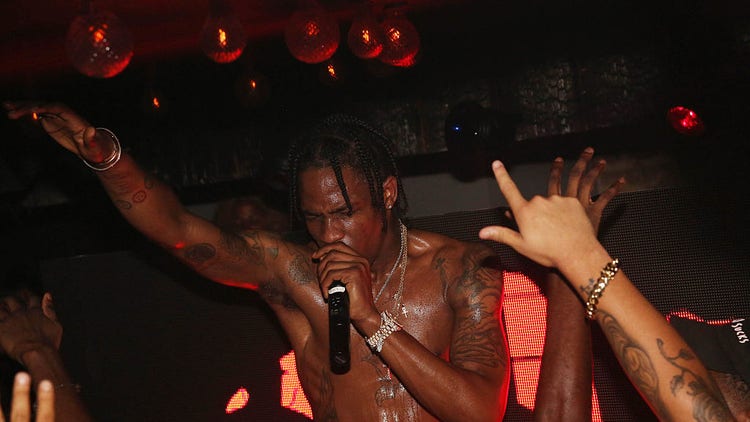 Travis Scott performing Rodeo at listening party