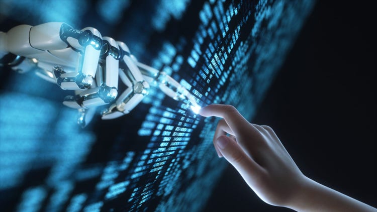 Physical hand reaching out for digital hand