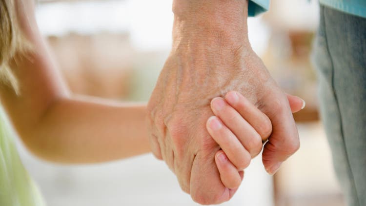 child holding hands