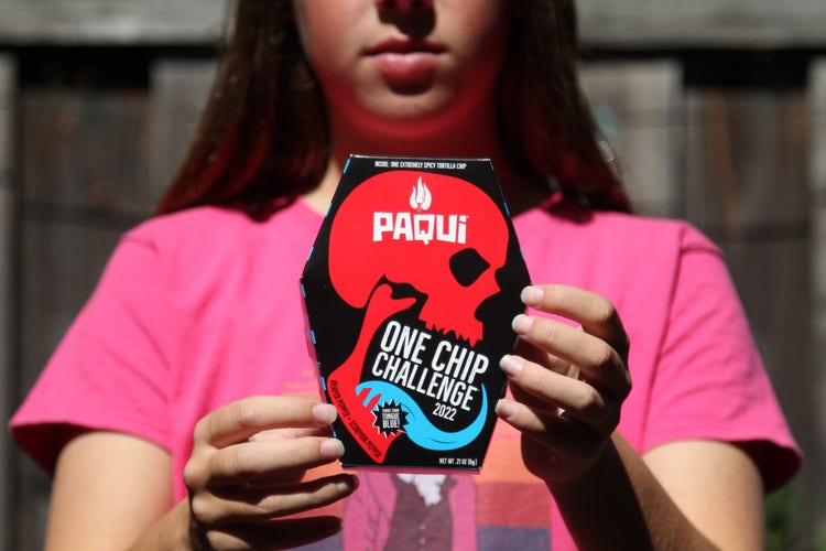 A recent social media trend has caused some children to vomit, sweat profusely and their tongues turn blue after participating in the One Chip Challenge.