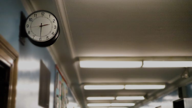 Interior of a school cooridor with a wall clock