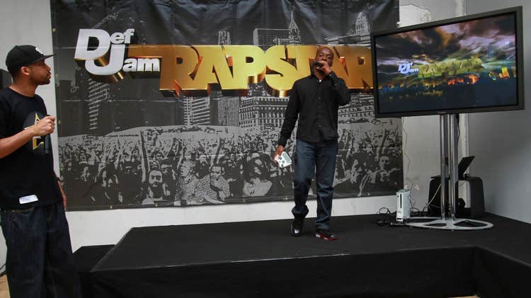 A man plays a video game by rapping