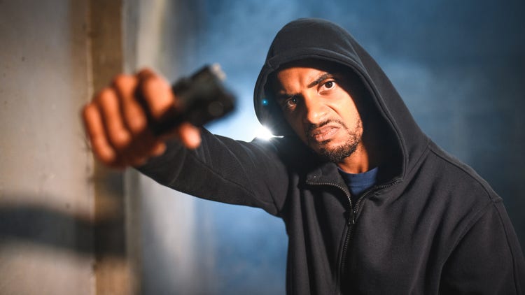 Black man with gun