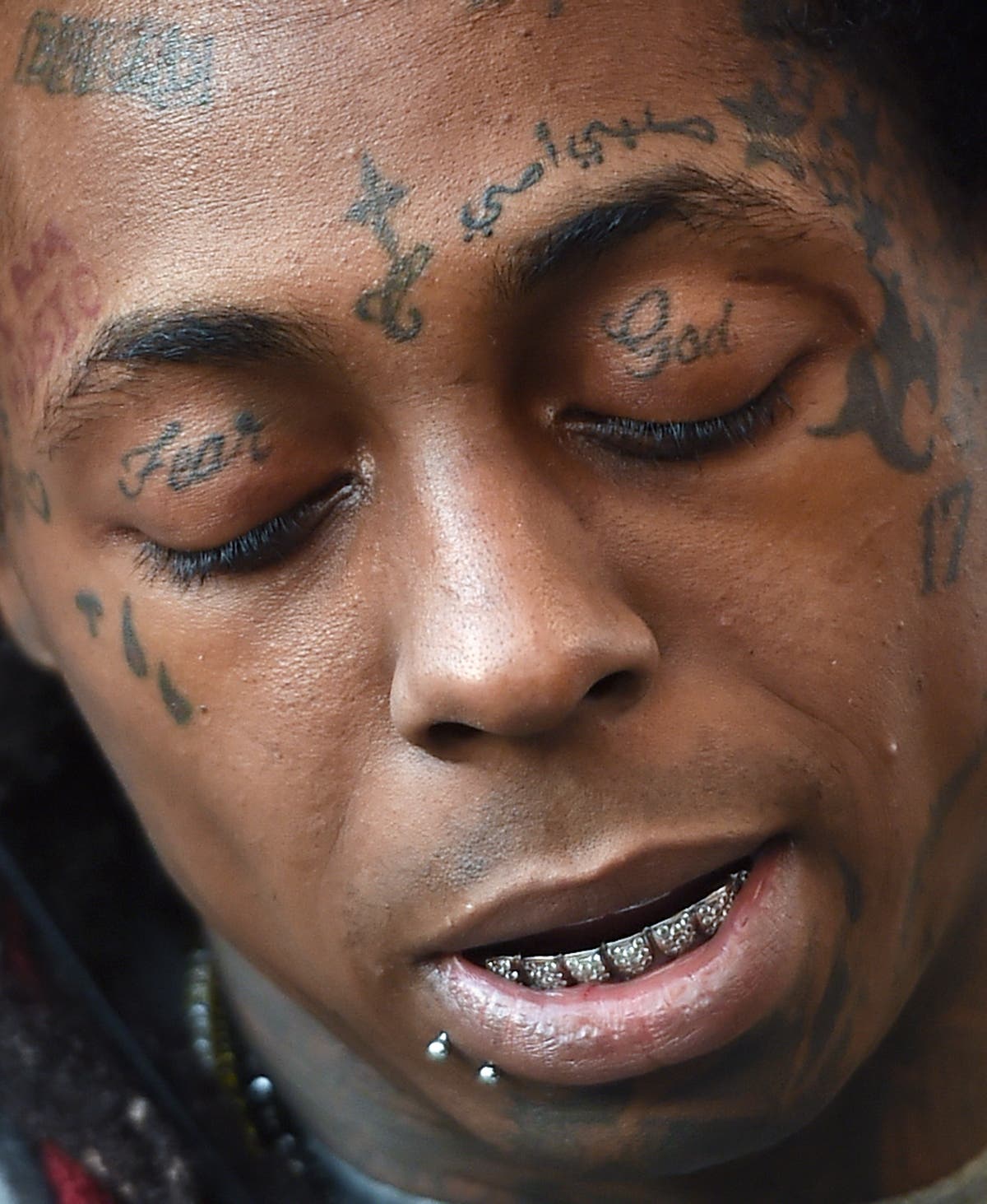 Rappers With Rare Under-Eye Tattoos
