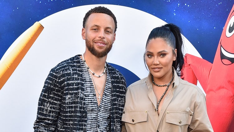 A person and person posing for a picture Description automatically generated