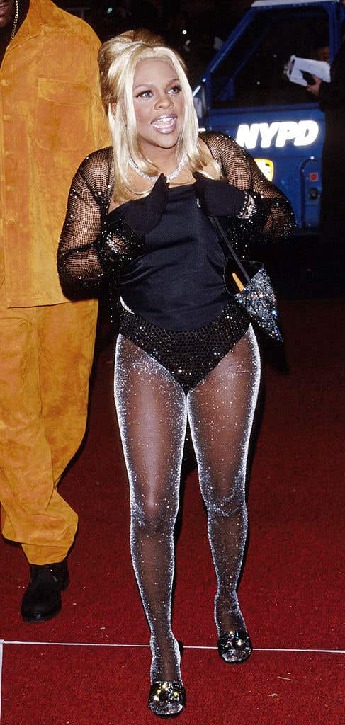 Check out Lil' Kim's 17 most iconic looks