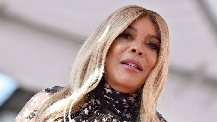 A person with blonde hair Description automatically generated