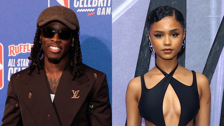 A person and person posing for a picture Description automatically generated