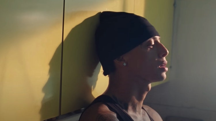 A person wearing a hat Description automatically generated